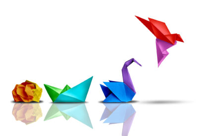 Success transformation and Transform to succeed or improving concept and leadership in business through innovation and evolution with paper origami changed for the better.